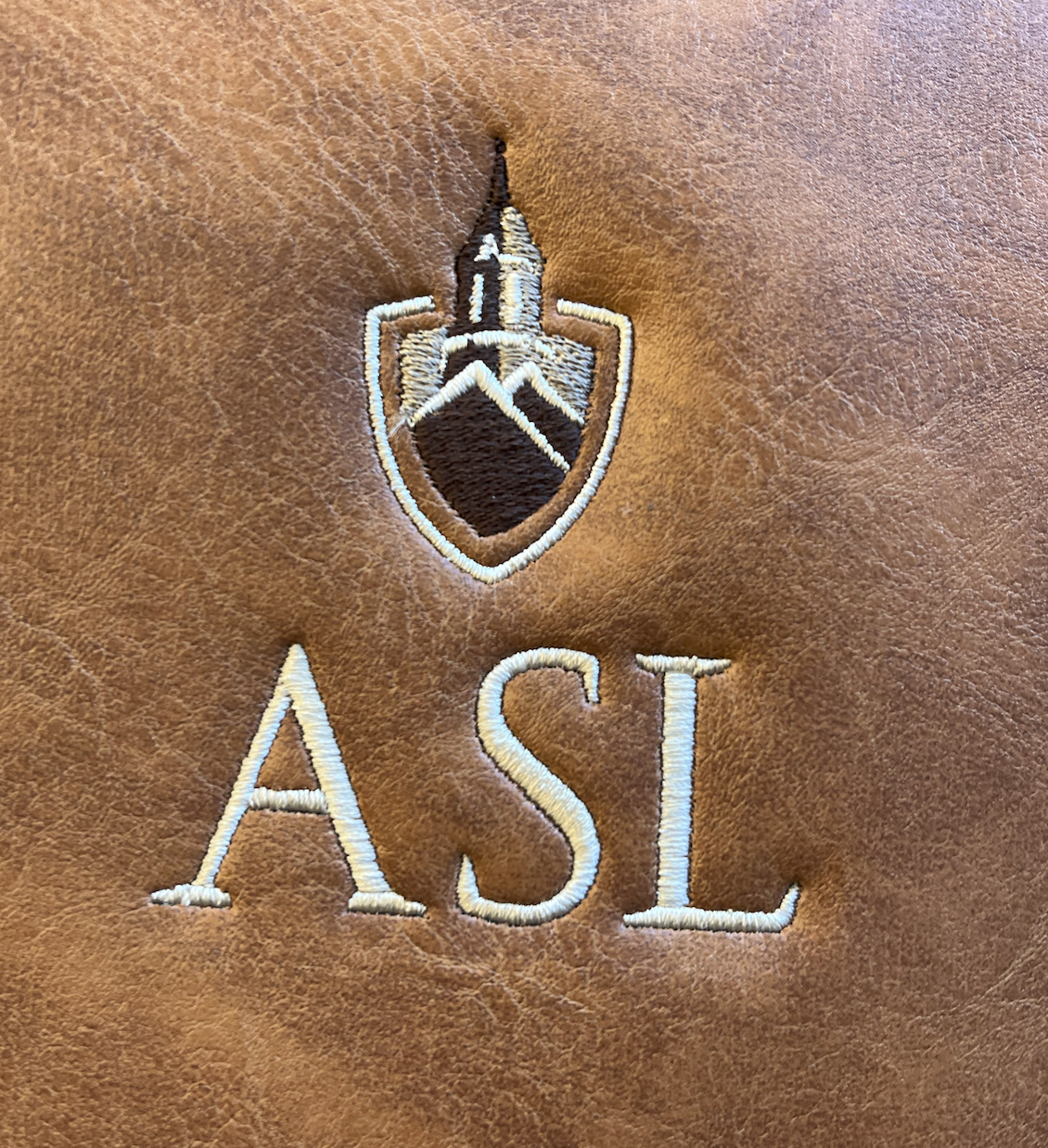Embroidered ASL Leather Backpacks